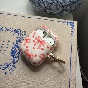Apple Earbud Headphones with Pink Bow Design